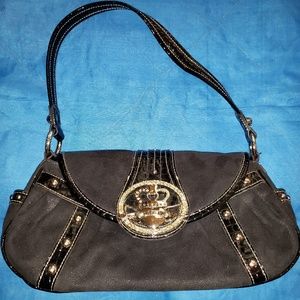 Kathy Van Zeeland studded hand bag